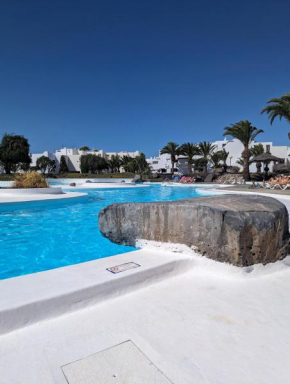 Charming Flat in Los Molinos with Terrace & Pools, Near Playa Bastian